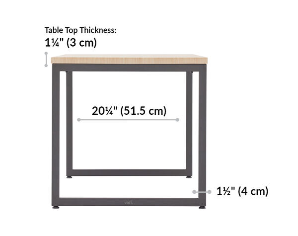 light wood vari table inset base is 26 and a half inches. Table top thickness 1 and 1 quarter inches and table leg thickness is 1 and1 quarter inches.